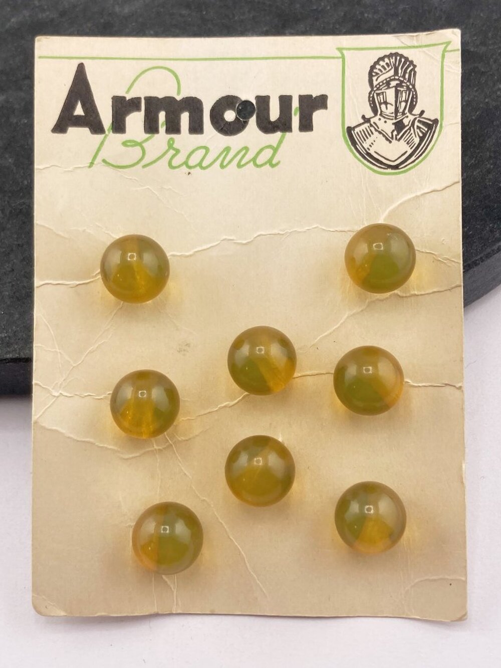 VINTAGE Deadstock set of eight matching yellow-green Bakelite sewing buttons NOS